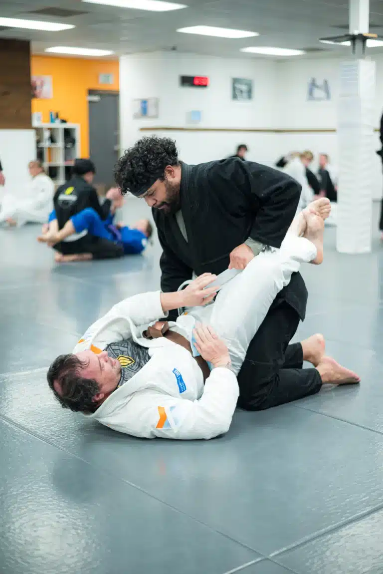 Jason training Jiu-Jitsu in nice white gi